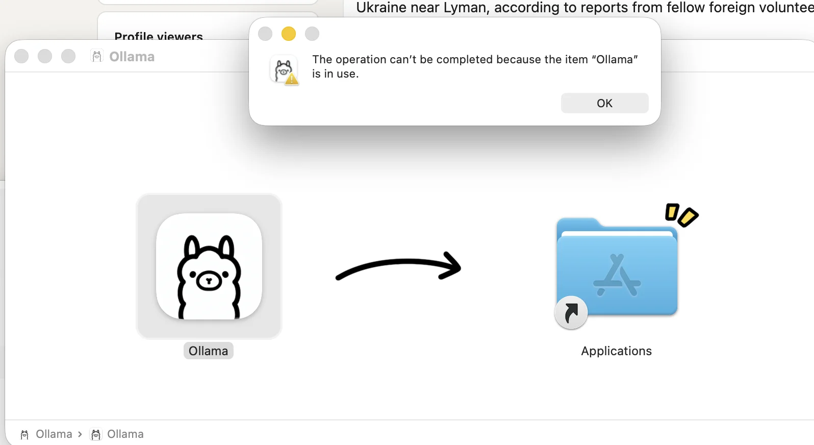 macOS warning saying the Ollama application cannot be replaced because the item is currently in use